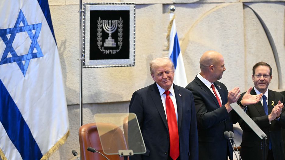 JERUSALEM - OCTOBER 13: U.S. President Donald Trump (L) receives a standing ovation before speaking at the Israeli parliament, the Knesset, on October 13, 2025 in Jerusalem. President Trump is visiting the country hours after Hamas released the remaining Israeli hostages captured on Oct. 7, 2023, part of a US-brokered ceasefire deal to end the war in Gaza. (Photo by Saul Loeb - Pool/Getty Images)