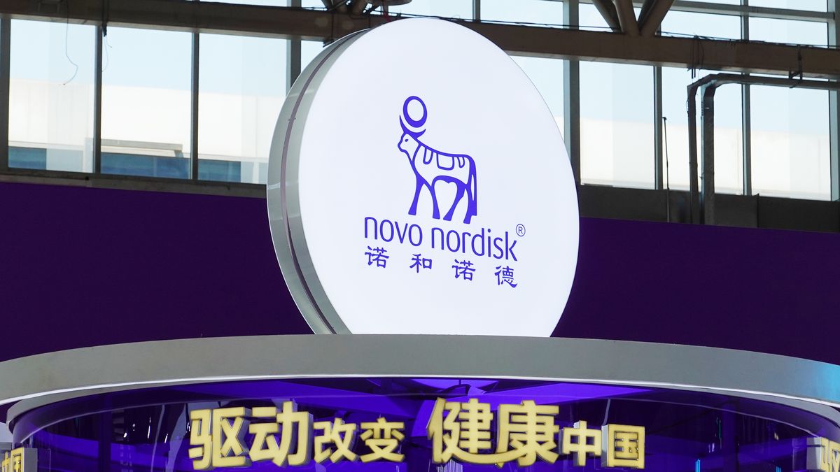 BEIJING, CHINA - 2025/07/18: The circular logo of Novo Nordisk on the booth with the slogan "Drive Change for a Healthy China" at the 3rd China International Supply Chain Expo. The third edition of CISCE has brought together more than 650 companies and institutions from 75 countries and regions said the China Council for the Promotion of International Trade the organizer of the expo. (Photo by Sheldon Cooper/SOPA Images/LightRocket via Getty Images)