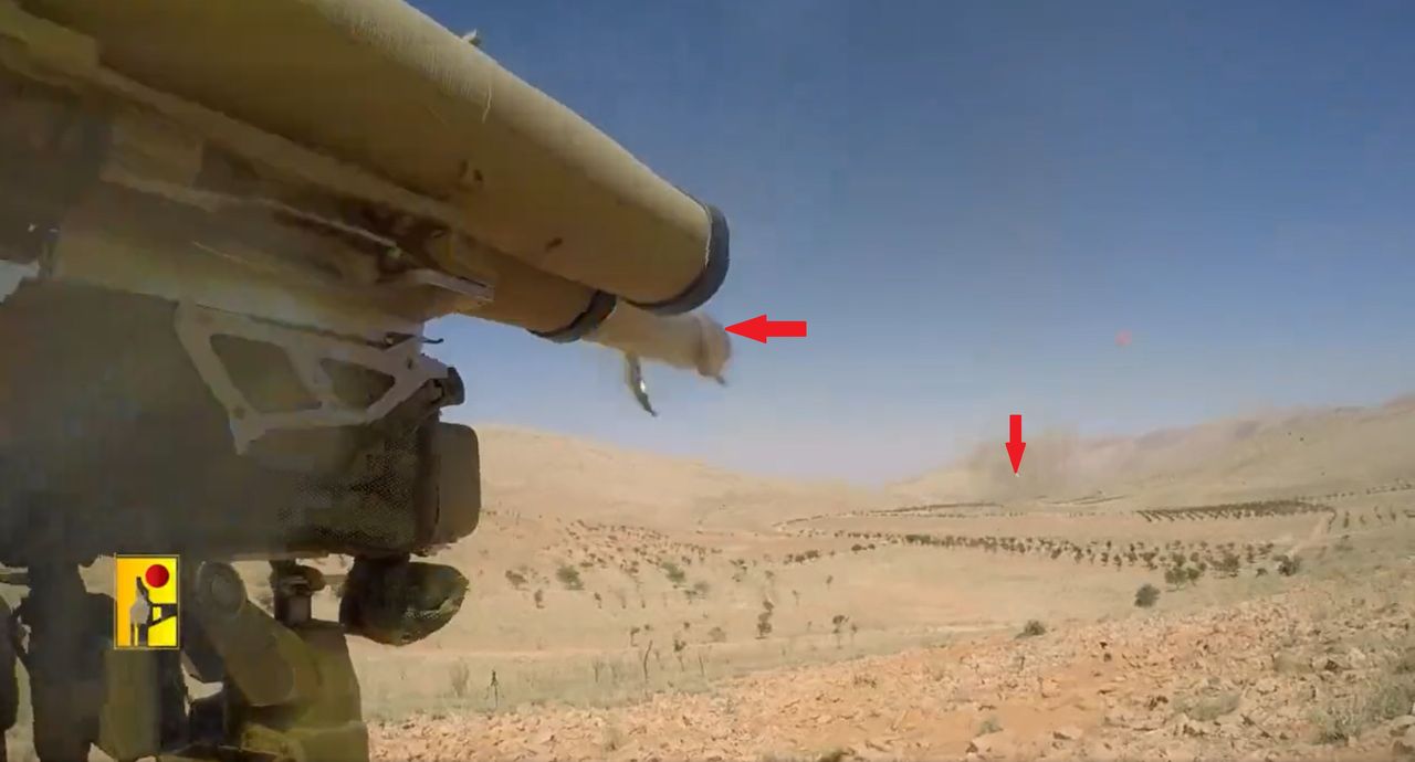 A Hezbollah fighter testing the "Thar Allah" launcher (you can clearly see the missile that has already been fired and one that is just being launched).