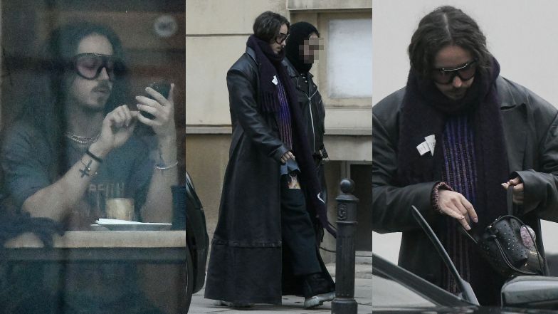 Michał Szpak na mieście w długim płaszczu