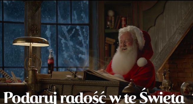 Podarunki radości i czerwone ciężarówki reklamują Coca-Colę na Boże Narodzenie (wideo)