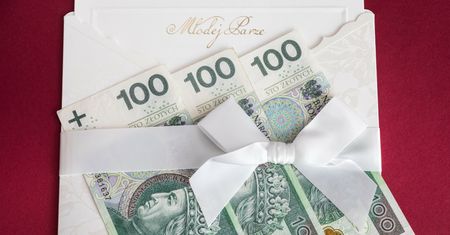 Komunijna najniższa krajowa. Tyle daje się do koperty w 2025 r.