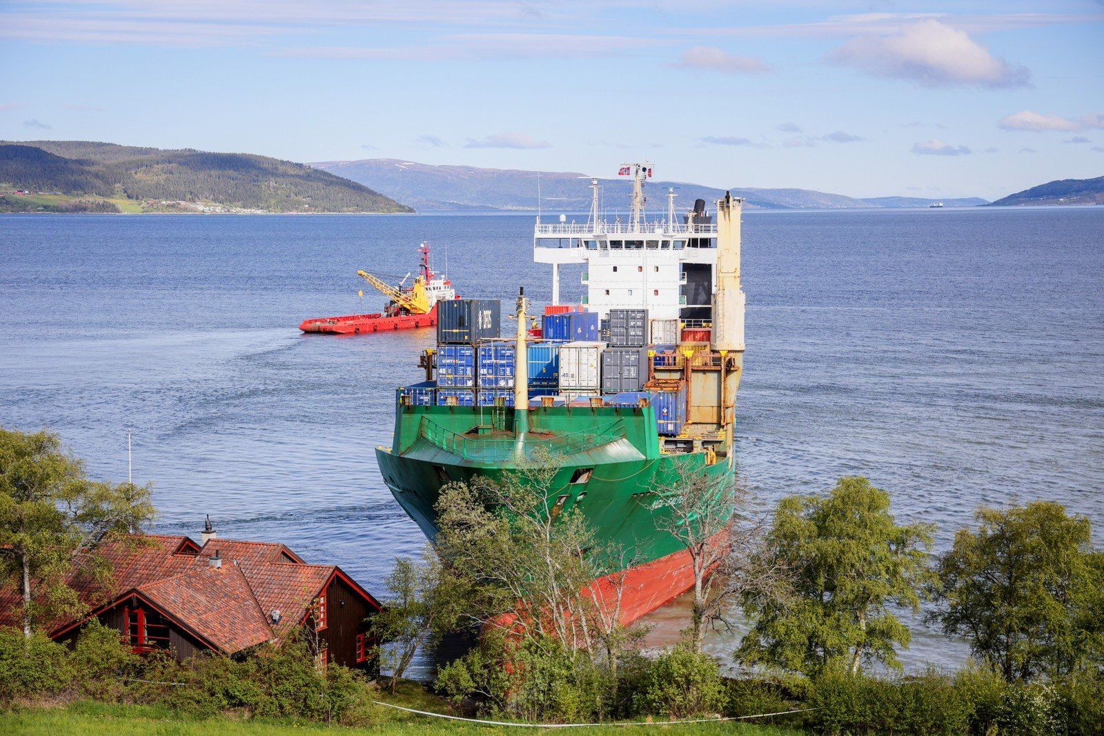 Container ship runs in Trondheimsfjord