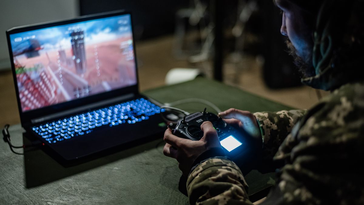 UKRAINE - MARCH 12: A recruit of the 1st Separate Mechanized Battalion ‘Da Vinci Wolves’ named after Dmytro Kotsiubailo trains and learns to work with FPV strike drones while undergoing five-day training at a military outdoor firing range on March 12, 2024 in central Ukraine. After training, recruits can join the Armed Forces of Ukraine to defend Ukraine in the war started in 2014 and escalated during the full-scale Russian invasion in 2022. (Photo by Valentyna Polishchuk/Global Images Ukraine via Getty Images)
