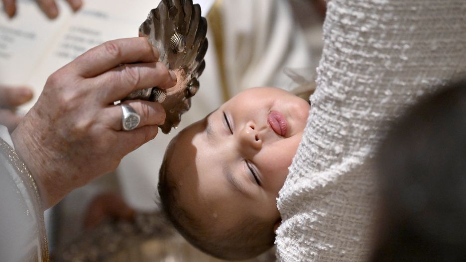 VATICAN CITY, VATICAN - JANUARY 07: (EDITOR NOTE: STRICTLY EDITORIAL USE ONLY - NO MERCHANDISING) Pope Francis baptises 16 infants in the Sistine Chapel on January 07, 2024 in Vatican City, Vatican. As is customary on the Feast of the Baptism of the Lord, Pope Francis baptised 16 infants in the Sistine Chapel, welcoming them into their new life of faith. (Photo by Vatican Media via Vatican Pool/Getty Images)