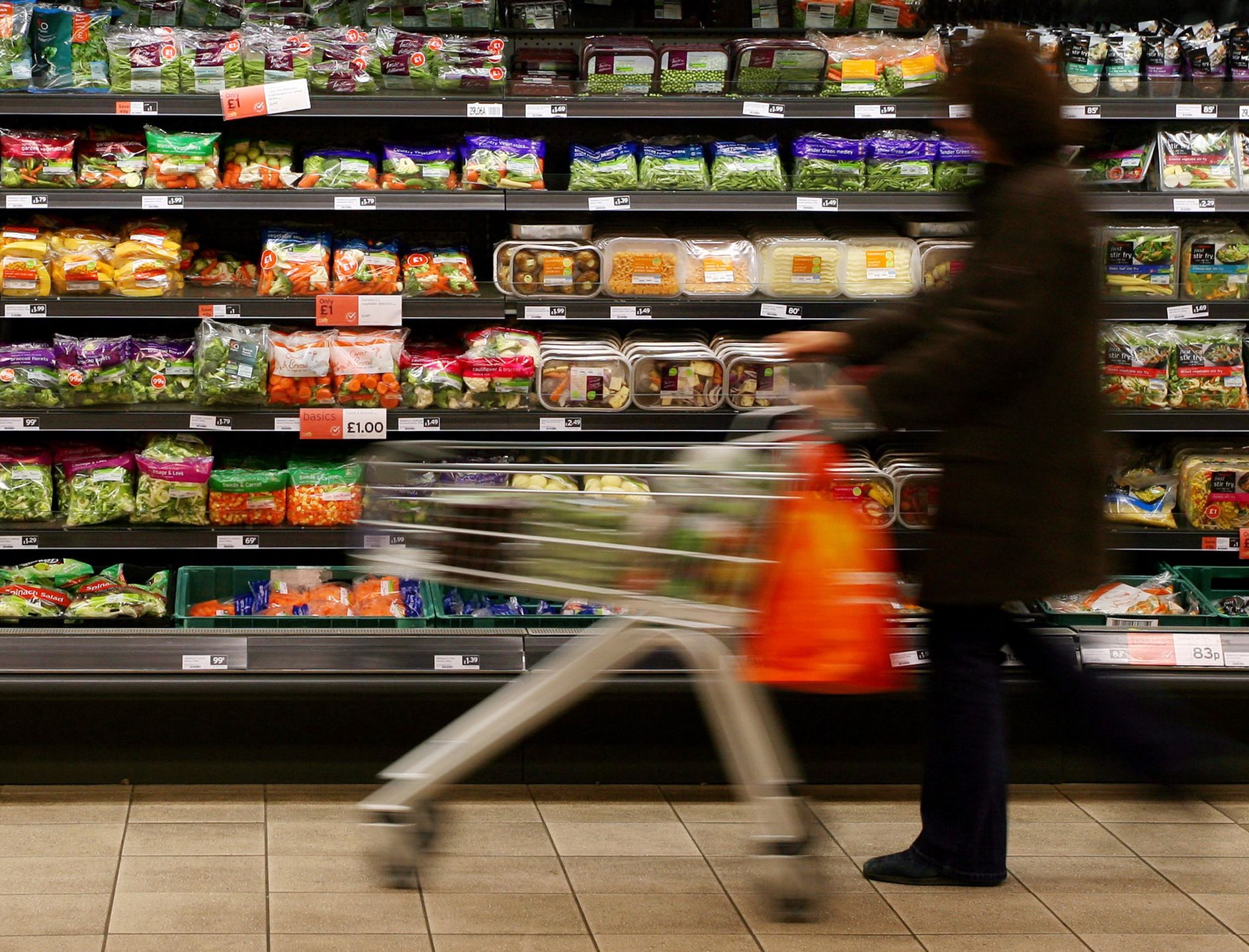 A customer walks past the pre-packed salads and vegetables oUNITED KINGDOM - FEBRUARY 29:  A customer walks past the pre-packed salads and vegetables on display at Sainsbury's supermarket, in London Colney, U.K., on Friday, Feb. 29, 2008. U.K. inflation probably reached the highest level in almost a year in March as food prices rose, adding to the Bank of England's dilemma as it weighs the need for interest-rate cuts to avert a recession.  (Photo by Chris Ratcliffe/Bloomberg via Getty Images)BloombergCOMMODITIES, ECONOMY, EUROPE, FOOD, RETAIL