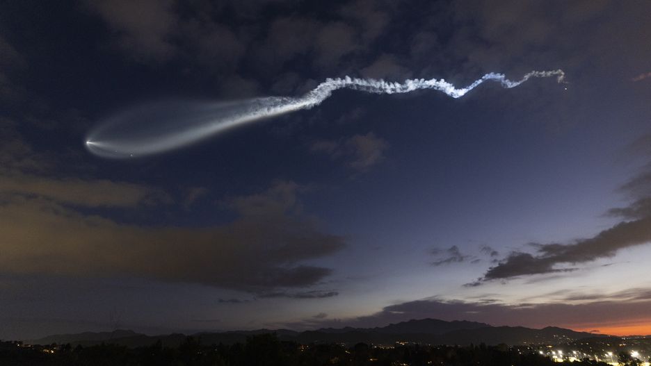 SAN DIEGO, CALIFORNIA - FEBRUARY 10: A SpaceX Falcon 9 rocket carrying a payload of 23 Starlink internet satellites soars into space after sunset after launching from Vandenberg Space Force Base on February 10, 2025, as seen from Thousand Oaks, California. The launch could be seen from several southwestern states. (Photo by Kevin Carter/Getty Images)