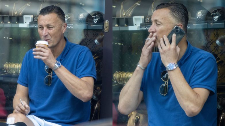 Tomasz Hajto delektuje się papierosem przed lombardem