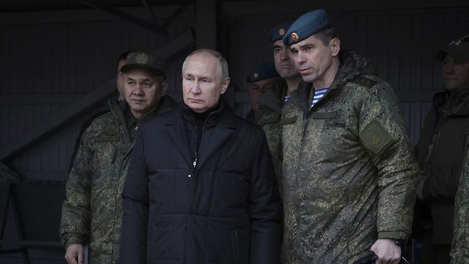 Temporary
In this handout photo released by Russian Defense Ministry Press Service, Russian President Vladimir Putin, center, Russian Defense Minister Sergei Shoigu, left, and Deputy Commander of the Airborne Troops Anatoly Kontsevoy, visit a military training centre of the Western Military District for mobilised reservists in Ryazan Region, Russia, Thursday, Oct. 20, 2022. (Russian Defense Ministry Press Service via AP)