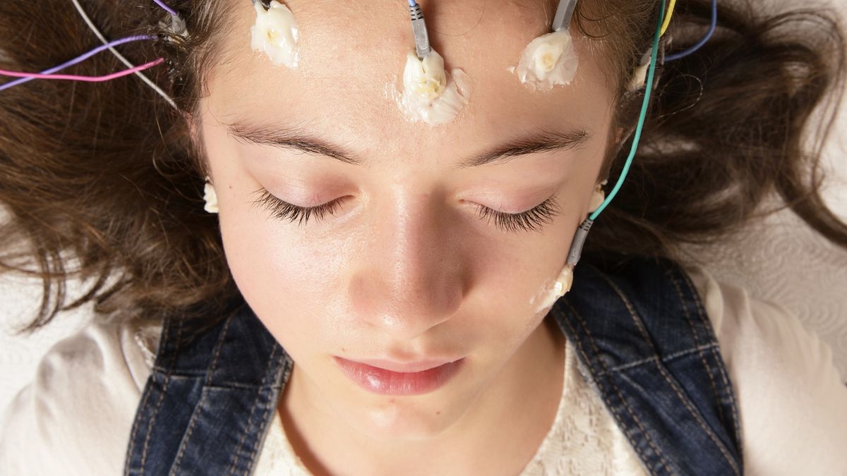 ElectroencephalographyActual Electroencephalography (EEG) recording net being used on a young girl. EEG is the recording of the brain's spontaneous electrical activity over a short period of time.fmajorSensor, Mental Health, Real People, Service, Young Women, Women, Females, Human Nervous System, Patience, Wave Pattern, Clinic, Epilepsy, Eyes Closed, Electrode, Neurosurgery, Human Scalp, Pediatrician, Medical Exam, Scientific Experiment, Child, Lying Down, Examining, Looking, Sleeping, Caucasian Ethnicity, One Person, Control, Exploration, Care, Healthcare And Medicine, Science, Research, Indoors, Vertical, Human Head, Human Brain, Illness, Patient, People, Hospital, Cable, Medicine, EEG, Medical Equipment, Power Line, Equipment, neuroscience, Hospital Bed, Neurological Examination