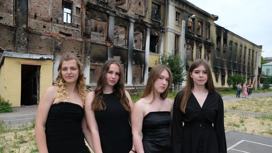Students in Kharkiv return to ruined school in prom dresses
KHARKIV, UKRAINE - JUNE 7: Students wearing their prom dresses pose for a photo among the ruins of their school destroyed in a Russian shelling on February 27, in Kharkiv, Ukraine on June 7, 2022. Teenagers in their gowns which they would have worn for their prom organized a graduation ceremony in their destroyed school. (Photo by Abdullah Unver/Anadolu Agency via Getty Images)
Anadolu Agency
damage, destroy, life, schild, school, shelling, tension, unrest