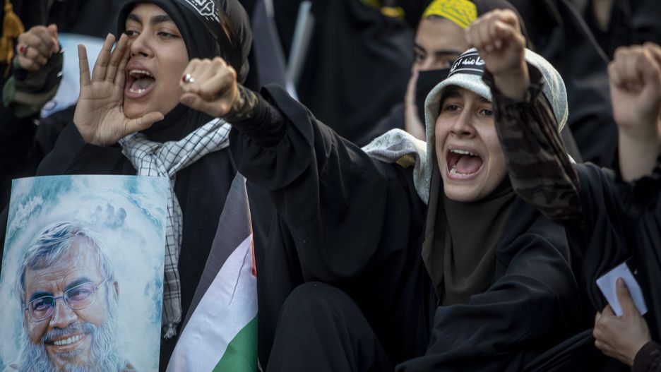 TEHRAN, IRAN - OCTOBER 3: Iranian students take part in a demonstration to show their anger toward the death of Hezbollah Leader Hassan Nasrallah  on October 3, 2024 in Tehran, Iran. Iran launched around 180 ballistic missiles toward Israel on Tuesday night, which came after Israel killed the leader of Hezbollah, the Iran-backed Lebanese militant and political group. (Photo by Majid Saeedi/Getty Images)