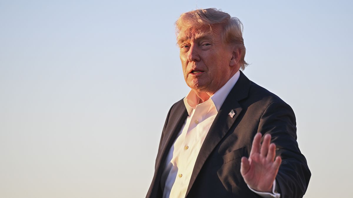JOINT BASE ANDREWS, MARYLAND - MAY 3: U.S. President Donald Trump waves while disembarking from Air Force One upon arrival from Miami on May 3, 2026 at Joint Base Andrews, Florida. Trump spent the weekend at his Mar-a-Lago resort in Doral, Florida.  (Photo by Roberto Schmidt/Getty Images)