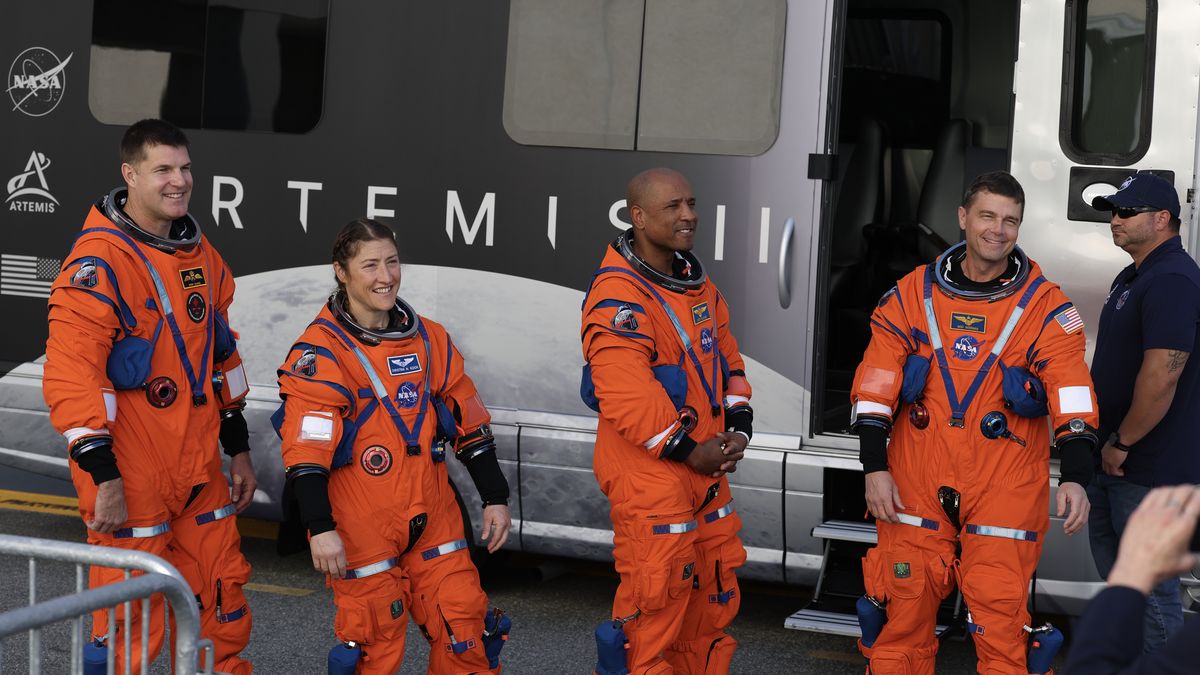 CAPE CANAVERAL, FLORIDA - DECEMBER 20: The Artemis II crew – (L-R) mission specialist Jeremy Hansen of CSA (Canadian Space Agency), mission specialist Christina Koch, pilot Victor Glover, and commander Reid Wiseman – rehearse a walkout from the Neil A. Armstrong Operations and Checkout Building at NASA’s Kennedy Space Center on December 20, 2025 in Cape Canaveral, Florida. The astronauts are rehearsing for the scheduled February 2026 10-day mission, which will take them around the Moon and back to Earth. (Photo by Joe Raedle/Getty Images)