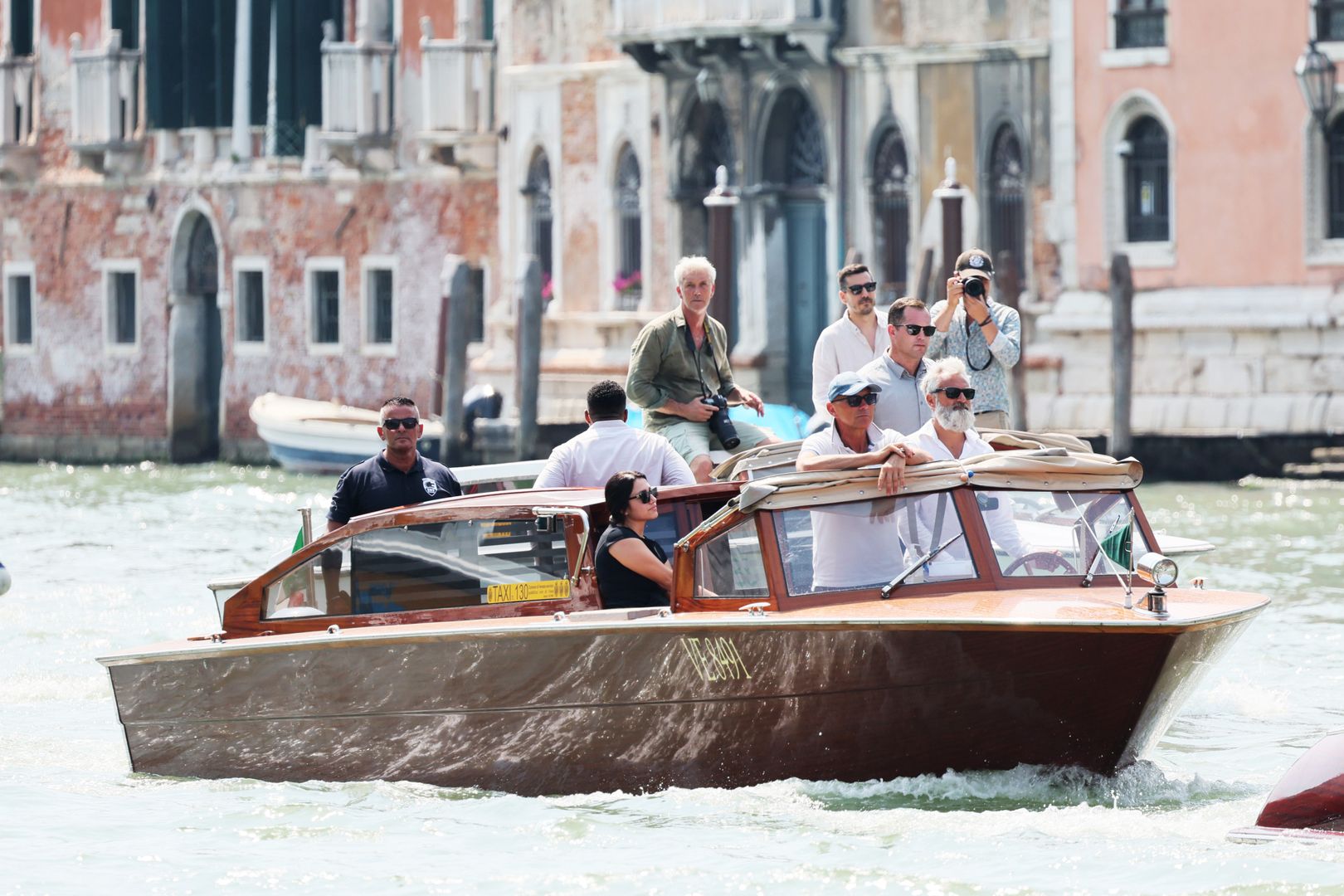 VENICE, ITALY - JUNE 25: Paparazzi follow the Jeff's Besos boat  ahead of Jeff Bezos and Lauren Sanchez Wedding at Hotel Aman on June 25, 2025 in Venice, Italy. (Photo by Ernesto Ruscio/GC Images)