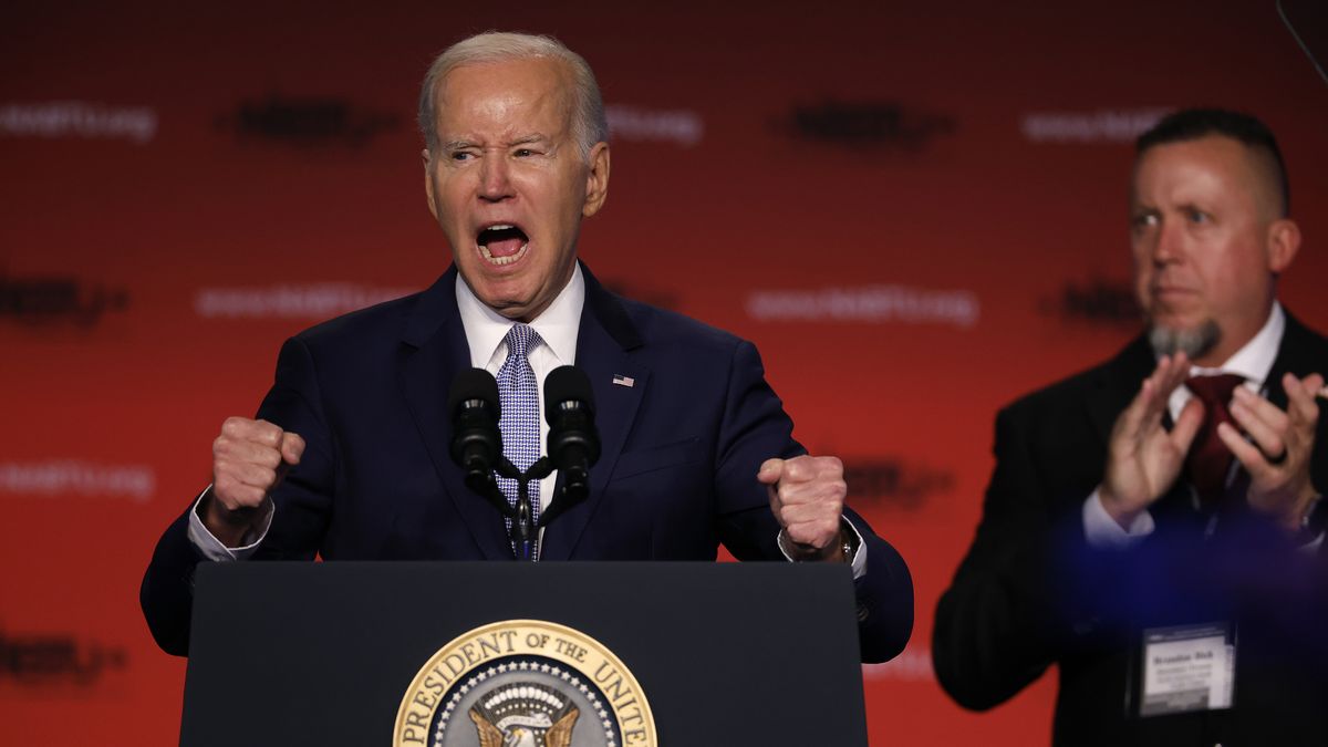 WASHINGTON, DC - APRIL 25: U.S. President Joe Biden (L) addresses the North America's Building Trades Unions as Secretary-Treasurer Brandon Bish listens during their legislative conference at the Washington Hilton on April 25, 2023 in Washington, DC. Earlier in the day, Biden released a video where he officially announced his re-election campaign. (Photo by Chip Somodevilla/Getty Images)