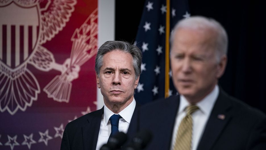 Antony Blinken, U.S. secretary of state, listens as U.S. President Joe Biden, right, speaks in the Eisenhower Executive Office Building in Washington, D.C., U.S., on Wednesday, March 16, 2022. Biden outlined the United States' assistance to Ukraine following an emotional appeal from Ukrainian President Volodymyr Zelenskiy for Biden to lead the world in punishing Moscow for its invasion. Photographer: Al Drago/Bloomberg via Getty Images