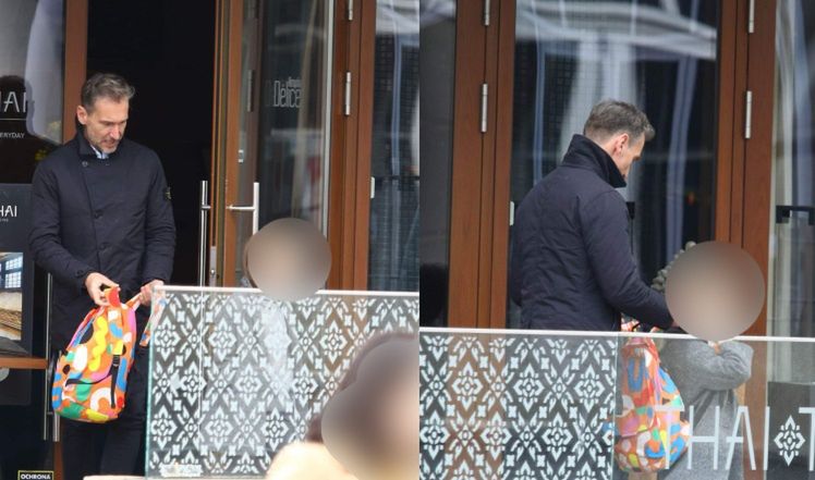 Piotr Kraśko z żoną i córką w restauracji