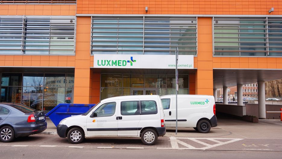 POZNAN, POLAND - Mar 08, 2019: Parked cars in the cityPOZNAN, POLAND - Mar 08, 2019: Parked cars in front of a Luxmed medical office in the Globis building on the Slowackiego street in the city center.parking,  medical,  color,  city,  exterior,  sign,  vehicles,  office,  globis,  building,  healthcare,  horizontal,  view,  poznan,  modern,  public,  road,  car,  street,  logo,  company,  place,  entrance,  brand,  day,  architecture,  side,  parked,  business,  work,  center,  luxmed,  asphalt,  transport,  windows,  transportation,  outdoor,  cars,  urban,  outside,  spots,  front,  polish,  architectural,  slowackiego, parking, medical, color, city, exterior, sign, vehicles, office, globis, building, healthcare, horizontal, view, poznan, modern, public, road, car, street, logo, company, place, entrance, brand, day, architecture, side, parked, business, work, center, luxmed, asphalt, transport, windows, transportation, outdoor, cars, urban, outside, spots, front, polish, architectural, slowackiego