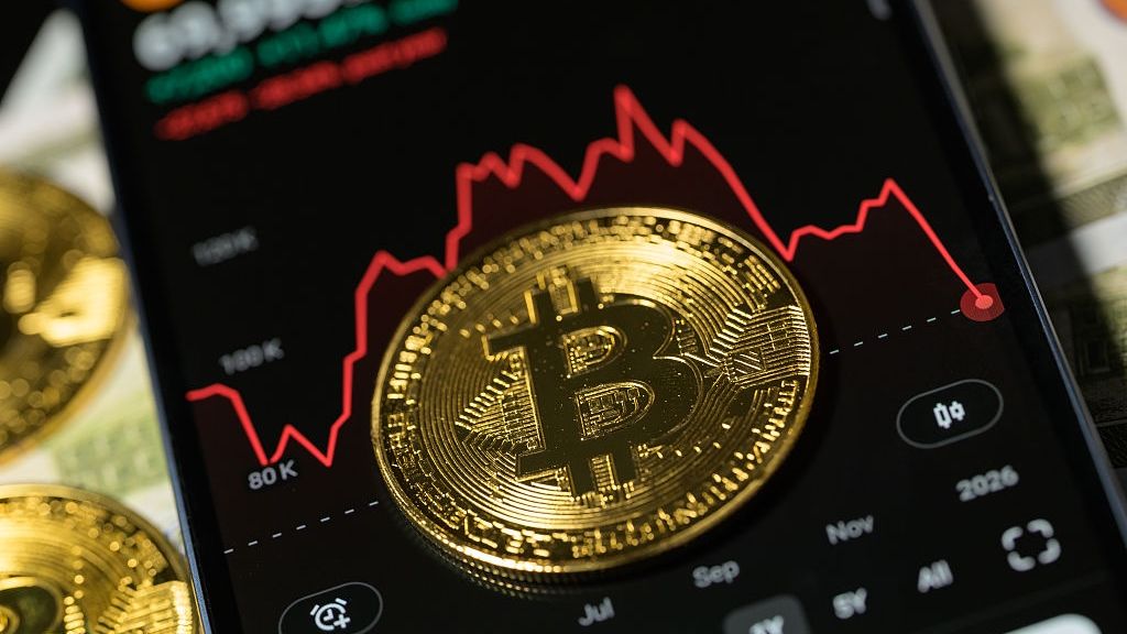 Bitcoin - Cryptocurrency Market - Photo Illustration
Tokens representing Bitcoin are placed on a mobile screen showing a declining cryptocurrency chart BTC - U.S. Dollar, seen in this photo illustration in Brussels, Belgium, on February 6, 2026. (Photo by Jonathan Raa/NurPhoto via Getty Images)
NurPhoto
bitcoin mining, exchange trading, inflation hedge, market volatility, bitcoin network, institutional investment, btc, halving, us crypto regulation, current crypto news, on-chain analytics, digital gold, blockchain technology, wallet security, bitcoin etf, payment networks, economic impact, network upgrades, bitcoin price, spot market, bitcoin ecosystem, btc usd, mining difficulty, btc market cap, retail investors, sec, digital asset, financial markets, regulatory news, crypto asset, crypto market, investment asset, bitcoin supply, peer-to-peer transactions, futures trading, proof of work, technology innovation, hash rate