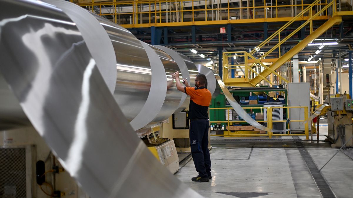 A worker fixes a storage instruction note to a roll of aluminium sheet at the Ball Packaging Europe Ltd. can manufacturing plant in Belgrade, Serbia, on Tuesday, Sept. 24, 2024. The trajectory of Fed easing is important for metals, which have wavered in recent months on uncertainty over the state of the US economy and concerns over softness in global factory activity. Photographer: Oliver Bunic/Bloomberg via Getty Images
