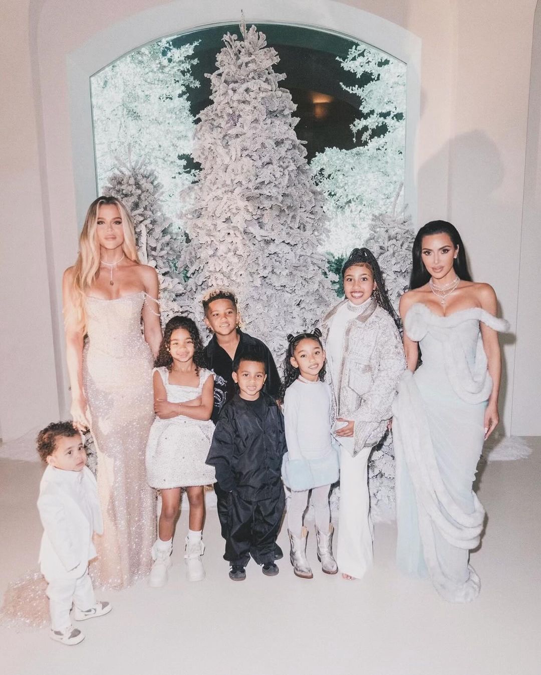 Kim Kardashian with kids at a Christmas party