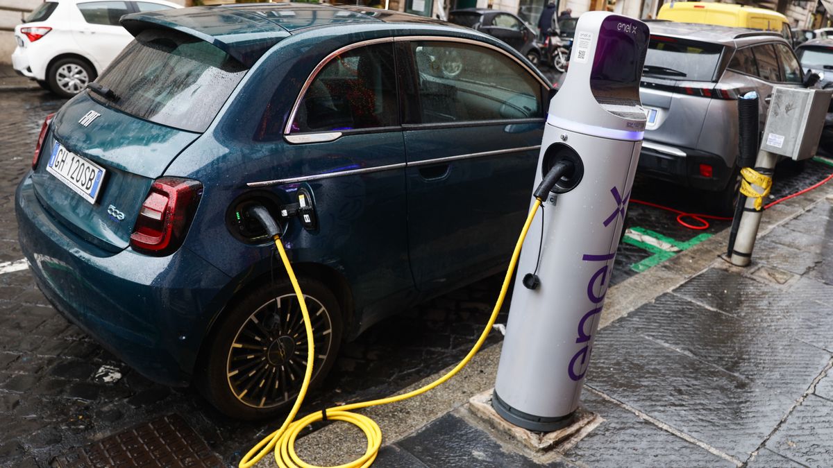 Electric Fiat 500 car is seen charging at Enel X charging point in Rome, Italy on March 26, 2024. (Photo by Jakub Porzycki/NurPhoto via Getty Images)