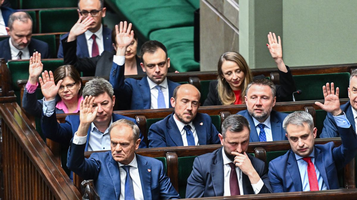 WARSAW, POLAND - APRIL 12: Polish Prime Minister, Donald Tusk (front, L) and some members of his cabinet raise their hands during the voting on four draft projects on abortion rights at the Polish Parliament( SEJM) on April 12, 2024 in Warsaw, Poland. The center-right government led by Donald Tusk has proposed ending the country's near-total ban on abortion to allow for the procedure up to the 12th week of pregnancy. Lawmakers are also considering alternative, less far-reaching bills proposed by other parties in the governing coalition, which is divided on the issue of abortion rights. (Photo by Omar Marques/Getty Images)