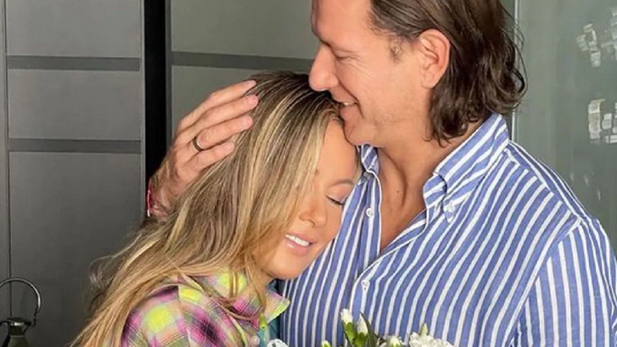 Radosław Majdan z żoną