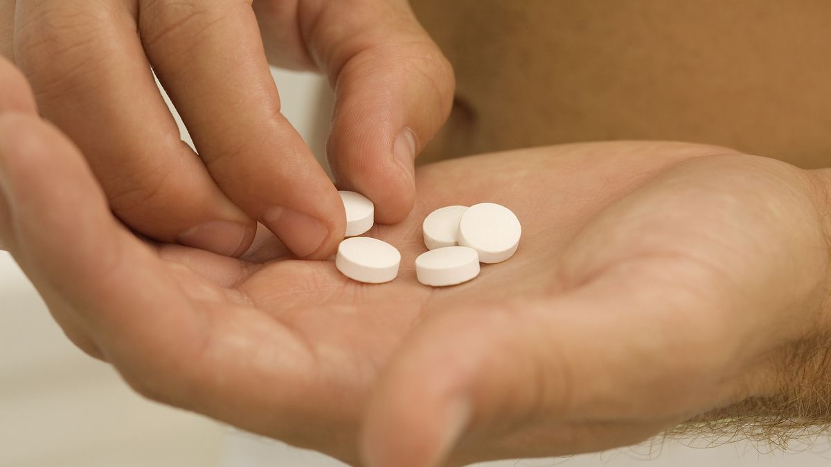 Tablets lying on a person's palm, close-up
Medioimages/Photodisc