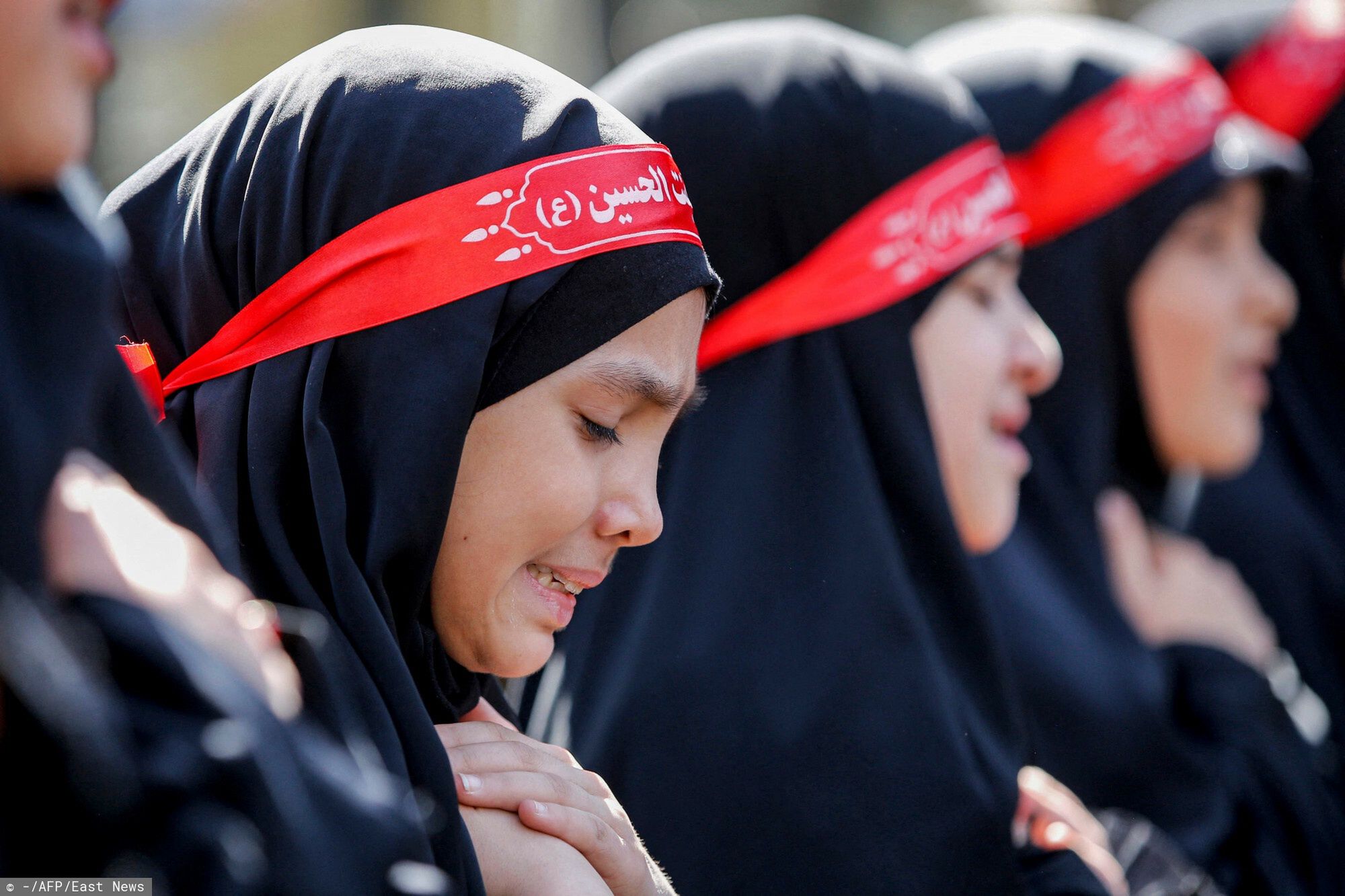 TemporaryShiite Muslim women devotees gather in Iran's capital Tehran on September 17, 2022 to mark the holy day of Arbaeen (Arabic for "fortieth"), the end of the 40-day mourning period since Ashura, which commemorates the killing of the Prophet Mohamed's grandson Imam Hussein ibn Ali by the forces of the Ummayad caliph Yazid in 680 AD. (Photo by AFP)-