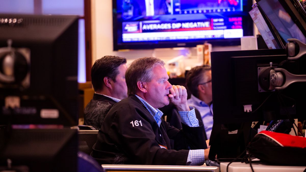Traders work on the floor of the New York Stock Exchange (NYSE) in New York, U.S., on Monday, June 27, 2022. Money managers betting on a sustained global rebound will be left sorely disappointed in the second half of this crushing year as a protracted bear market looms, even if inflation cools. Photographer: Michael Nagle/Bloomberg via Getty Images
