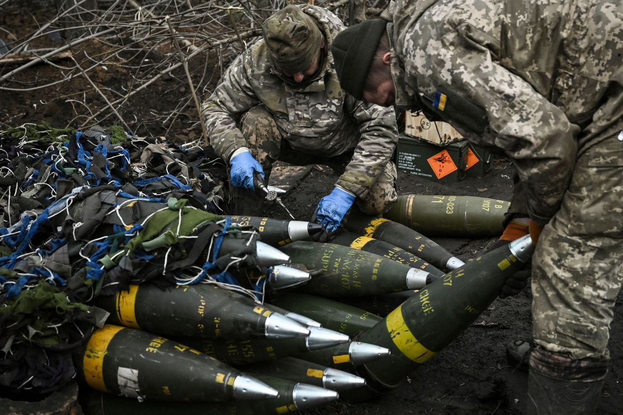 Ukrainian soldiers with 155 mm caliber ammunition preparing to shell Russian positions near Bahcmut.