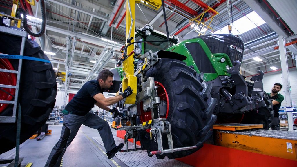German Tractor Manufacture At Fendt GmbH
Employees secure wheels to a Fendt 828 Vario tractor inside the Fendt GmbH agricultural machinery factory in Marktoberdorf, Germany, on Wednesday, Nov. 28, 2018. Healthy demand in the manufacturing sector helped boost the number of job vacancies in Germany by 23,000 to a record 1.24 million in the third quarter, according to the latest survey by the IAB Institute for Employment Research. Photographer: Krisztian Bocsi/Bloomberg via Getty Images
Bloomberg
Industry, EU, Manufacturing, Europe, EMEA, Heavy Equipment, Fabrication, E.U., Work, Employment, Labor, Jobs, mittelstand, Labour, Business Finance and Industry, Berlin