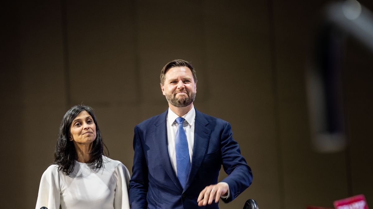 RENO, NEVADA: Republican Vice Presidential Nominee Senator J.D. Vance (R-OH) walks onto stage with his wife Usha Vance during a rally at the Reno Sparks Convention Center in Reno, Nevada on Tuesday July 30, 2024. (Melina Mara/The Washington Post via Getty Images)