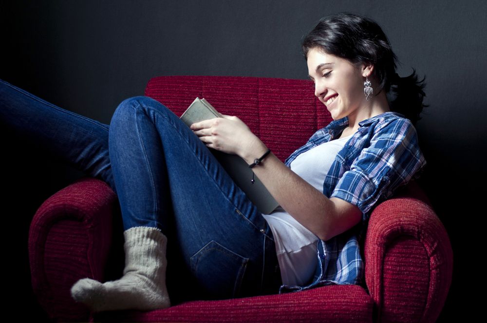 young woman reads