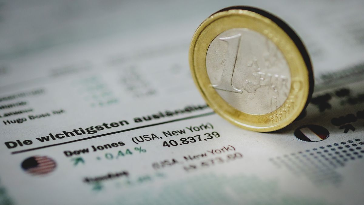 BERLIN, GERMANY - AUGUST 22: In this photo illustration an one euro coin is placed on the Dow Jones trend on August 22, 2024 in Berlin, Germany. (Photo Illustration by Florian Gaertner/Getty Images)