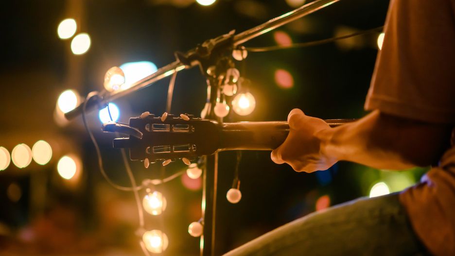Rear view of the man sitting play acoustic guitar on the outdoor concert with a microphone stand in the front, musical concept.Rear view of the man sitting play acoustic guitar on the outdoor concert with a microphone stand in the front, musical concept.one, rear view, outdoors, play, guitarist, song, instrument, music, young, string, hipster, guy, body, style, male, sitting, people, live, rock, outside, close-up, jazz, orange light, caucasian, singer, band, artist, street, man, finger, performer, lifestyle, stage, chord, fun, entertainment, sound, outdoor, country, concert, background, closeup, musical, acoustic, musician, hand, player, guitar, classic, performance, guitar, song, concert, music, musical, entertainment, musician, performance, guitarist, acoustic, live, outdoors, play, instrument, string, hipster, guy, body, style, male, sitting, people, rock, outside, jazz, caucasian, singer, band, artist, man, finger, performer, stage, chord, fun, sound, country, hand, classic, show, audio, classical, performing, space, copy, singing, expression, microphone