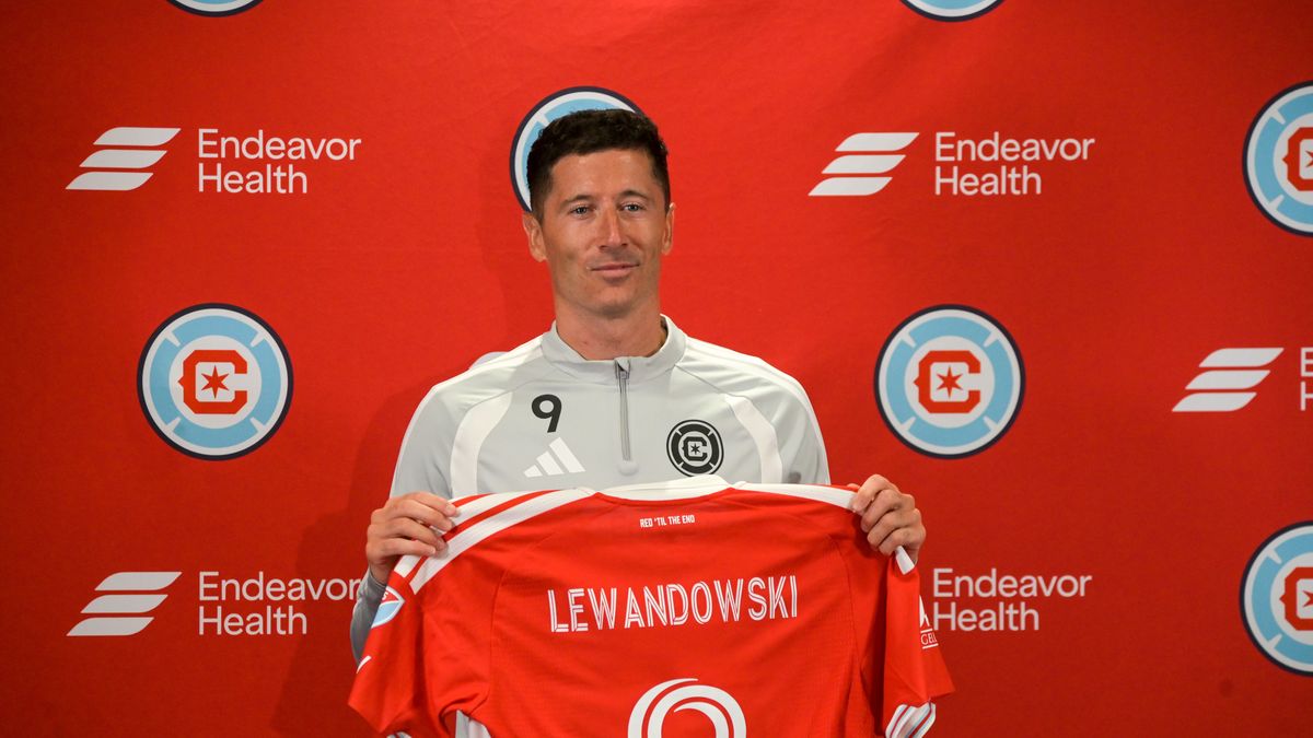 CHICAGO, ILLINOIS - JULY 14: Robert Lewandowski (9) poses with a jersey after being introduced by the Chicago Fire FC at a press conference at Endeavor Health Performance Center in Chicago, Illinois on July 14, 2026. (Photo by Jacek Boczarski/Anadolu via Getty Images)