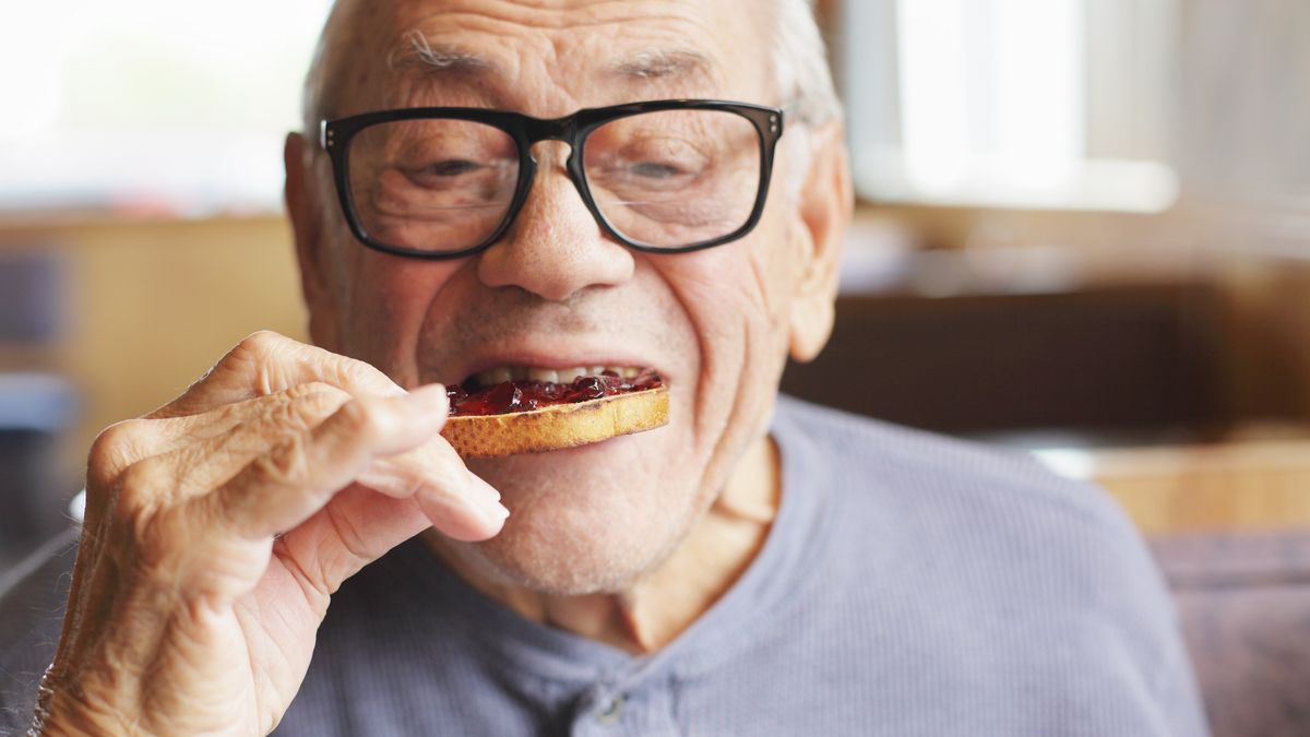 Senior Man Eating Toast and Jelly Jam
A senior man enjoys a bite of his toasted bread spread with sweet jelly jam preserves during breakfast at a restaurant. Selective focus on the toast and jelly.
Willowpix
80 Plus Years, Active Seniors, Photography, Senior Men, Men, Males, Meal, Retirement, Color Image, Toasted, Toasted Bread, Preserves, Diner, Senior Adult, Sitting, Eating, Biting, Holding, One Person, Enjoyment, Food And Drink, Lifestyles, Selective Focus, Indoors, Horizontal, Close-up, Head And Shoulders, Human Finger, Human Hand, Day, Restaurant, Breakfast, Sweet Food, Bread, Food, Eyeglasses, octogenarian