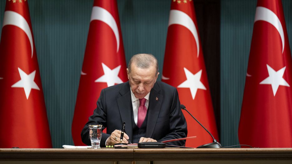 ANKARA, TURKIYE - MARCH 10: Turkish President Recep Tayyip Erdogan signs the decision on Turkish presidential and 28th Term Parliamentary Elections as he speaks after signing in Ankara, Turkiye on March 10, 2023. (Photo by Aytac Unal/Anadolu Agency via Getty Images)