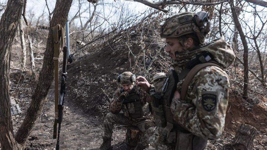 DONETSK OBLAST, UKRAINE - MARCH 05: Ukrainian soldiers await orders at artillery position in the direction of Niu York, Donetsk Oblast, Ukraine on March 05, 2025. (Photo by Diego Herrera Carcedo/Anadolu via Getty Images)