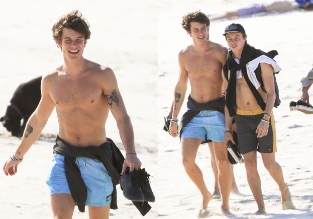 WYMUSKANY Shawn Mendes relaksuje się z kolegą na plaży (FOTO)