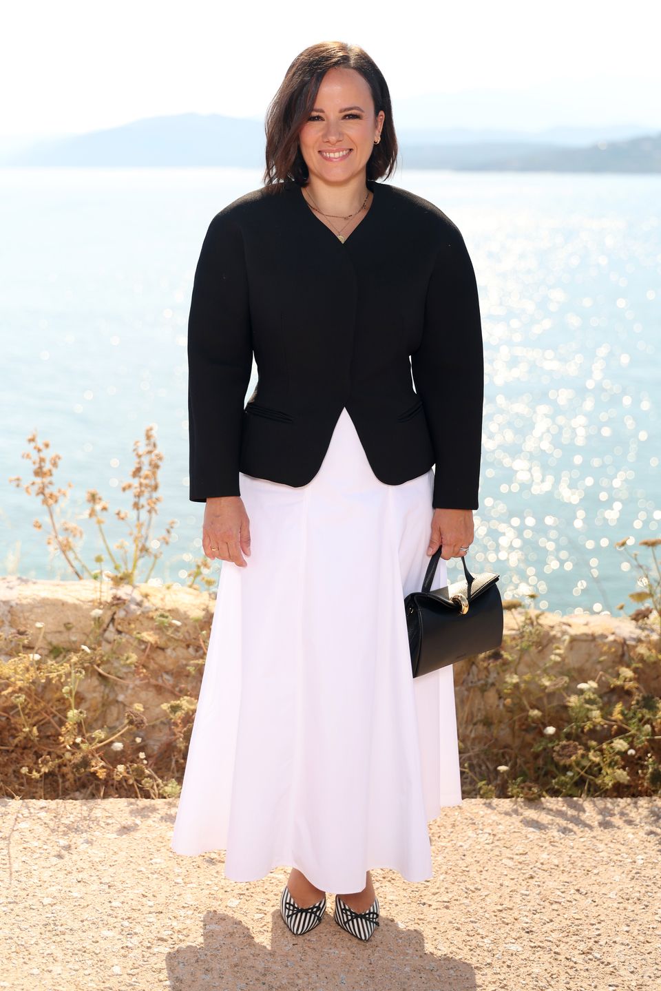 UNSPECIFIED, FRANCE - JUNE 29: Alizée attends the "Le Bonheur" By Jacquemus photocall at Phare de la Pietra, Corsica on June 29, 2026 in L'Ile-Rousse, France. (Photo by Aurore Marechal/Getty Images)
