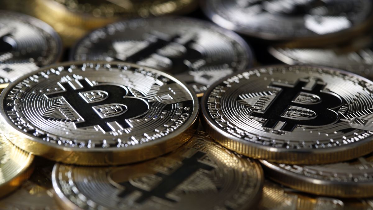 PARIS, FRANCE - APRIL 14: In this photo illustration, a visual representation of the digital Cryptocurrency, Bitcoin is on display on April 14, 2021 in Paris, France. The value of Bitcoin (BTC) has exceeded the threshold of 64,000 dollars for the first time in history. The Cryptocurrency overtakes the British Pound to become the 6th largest currency in the world. The total bitcoin market now represents $ 1.2 trillion, while that of all cryptocurrencies stands at $ 2251 billion. (Photo illustration by Chesnot/Getty Images)