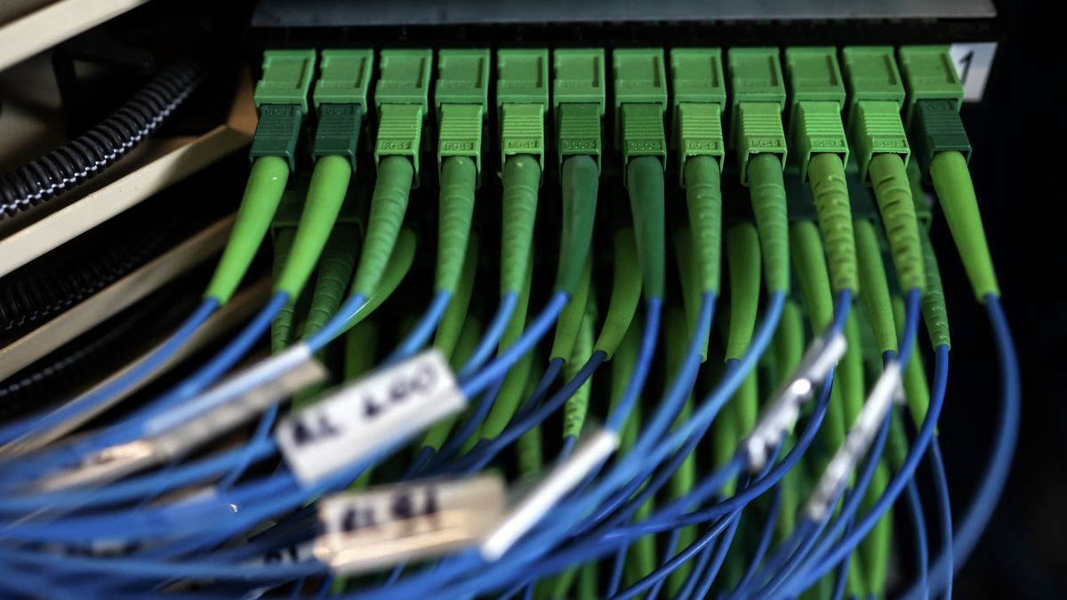 Fiber optic cables in an optical line termination in a Telecom Italia SpA telephone exchange in Rome, Italy, on Tuesday, April 4, 2023. Telecom Italia sold 400 million ($435 million) of bonds as it pushes ahead with the sale of its landline network in a bid to slash the companys debt pile after interest rates rose. Photographer: Alessia Pierdomenico/Bloomberg via Getty Images