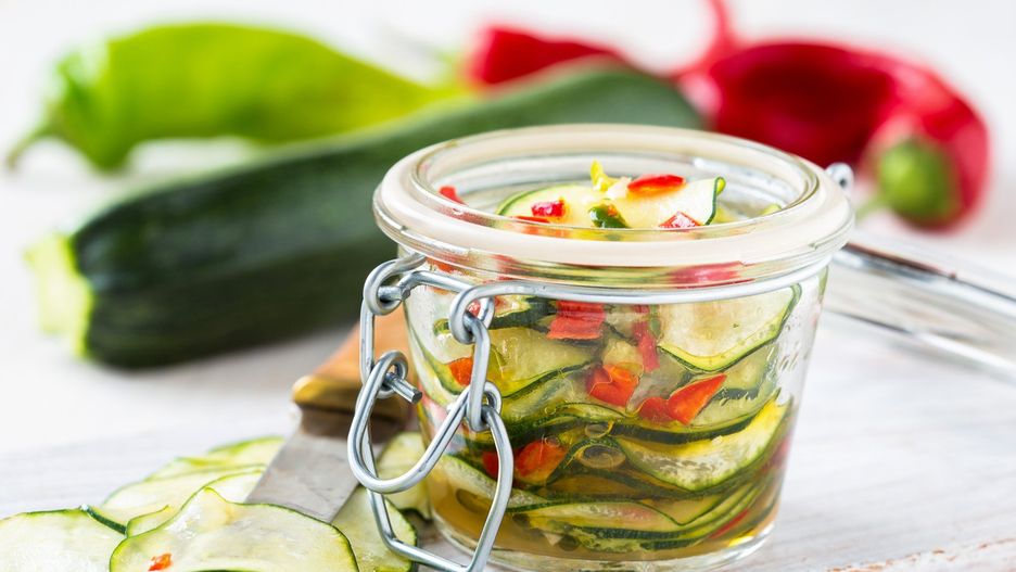 Marinated zucchini salad in glass jar