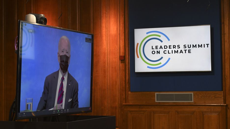 US President Joe Biden is on the screen inside the Downing Street Briefing Room, London, during the opening session of the virtual global Leaders Summit on Climate. Picture date: Thursday April 22, 2021. (Photo by Justin Tallis/PA Images via Getty Images)