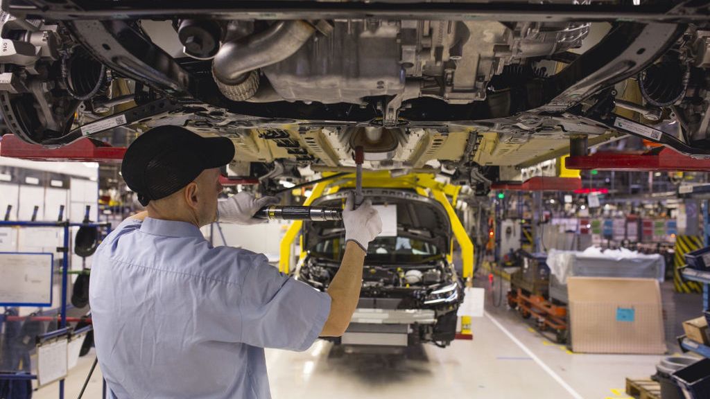 Opel Automobile Manufacture In Poland
A worker fits parts to the underside of a raised Opel Astra automobile on the production line at the Opel automobile plant in Gliwice, Poland, on Monday, March 6, 2017. The maker of Peugeot and Citroen cars will pay 1.8 billion euros ($1.9 billion) for GMs Opel unit and its U.K. sister brand Vauxhall, as the French manufacturer bolsters its defenses in a peaking market thats being transformed by technology, new competitors and Brexit. Photographer: Bartek Sadowski/Bloomberg via Getty Images
Bloomberg
Industry, Industrial, Manufacturing, Cars, Fabrication, Automotive, Automobiles, Manufacture