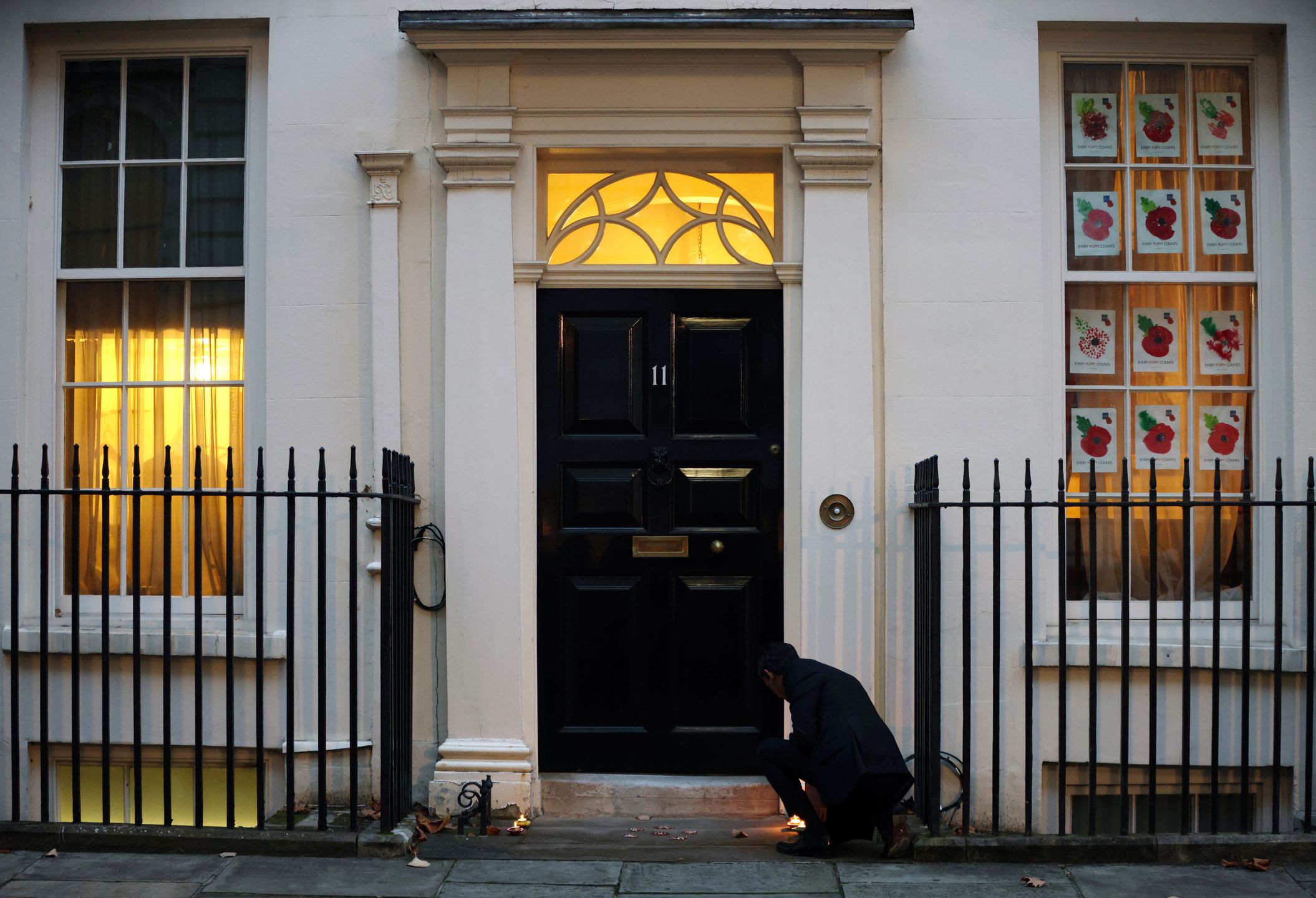 LONDON, ENGLAND - NOVEMBER 12: Chancellor Rishi Sunak lights a candle for Diwali in Downing Street on November 12, 2020 in London, England. The Hindu festival of lights takes place over five days starting Saturday, November 14. (Photo by Dan Kitwood/Getty Images)